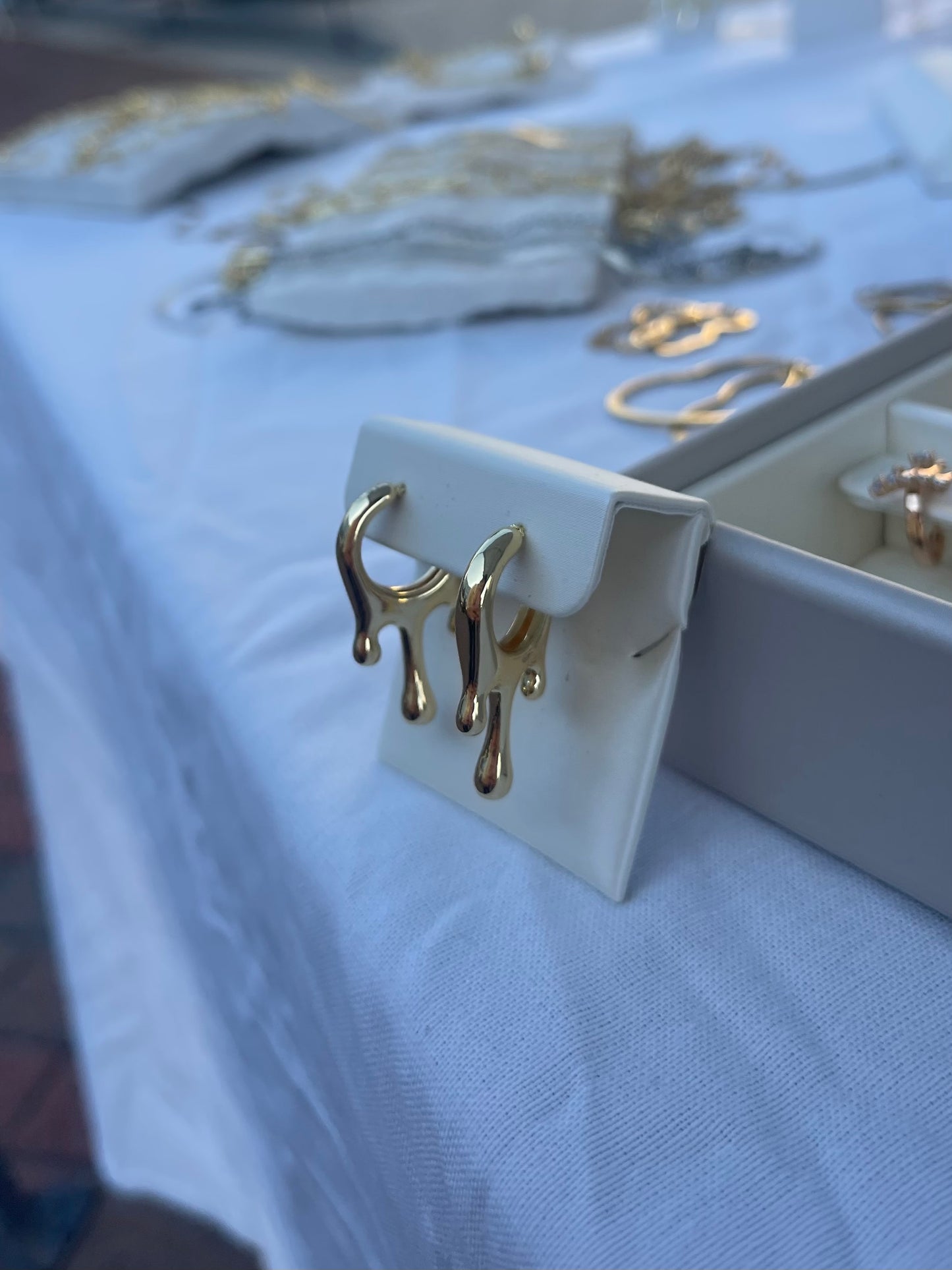 Dripping gold earrings