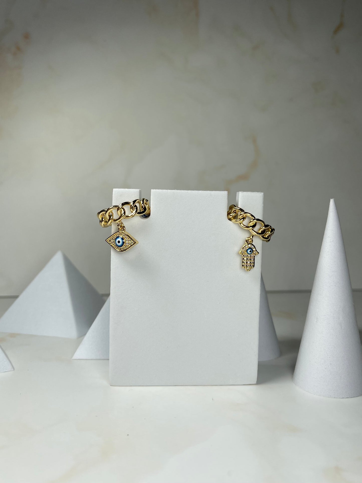 Gold chain ring with pendant