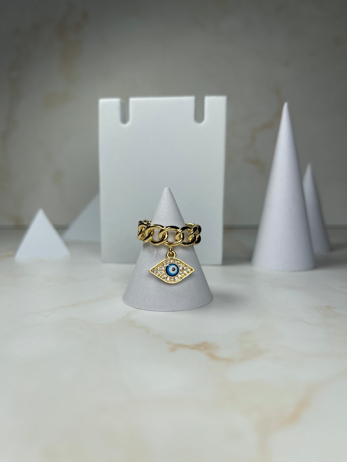 Gold chain ring with pendant