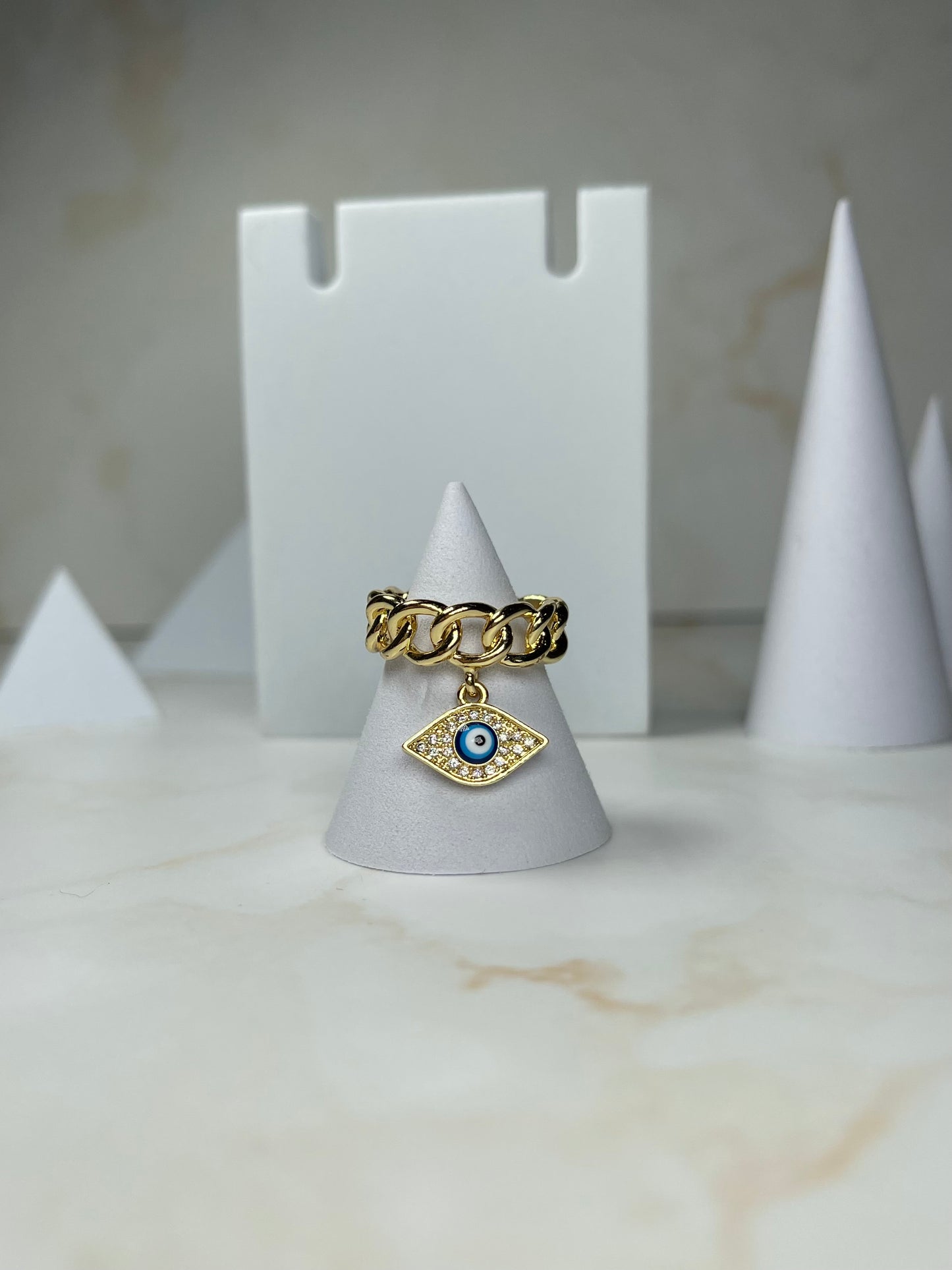 Gold chain ring with pendant