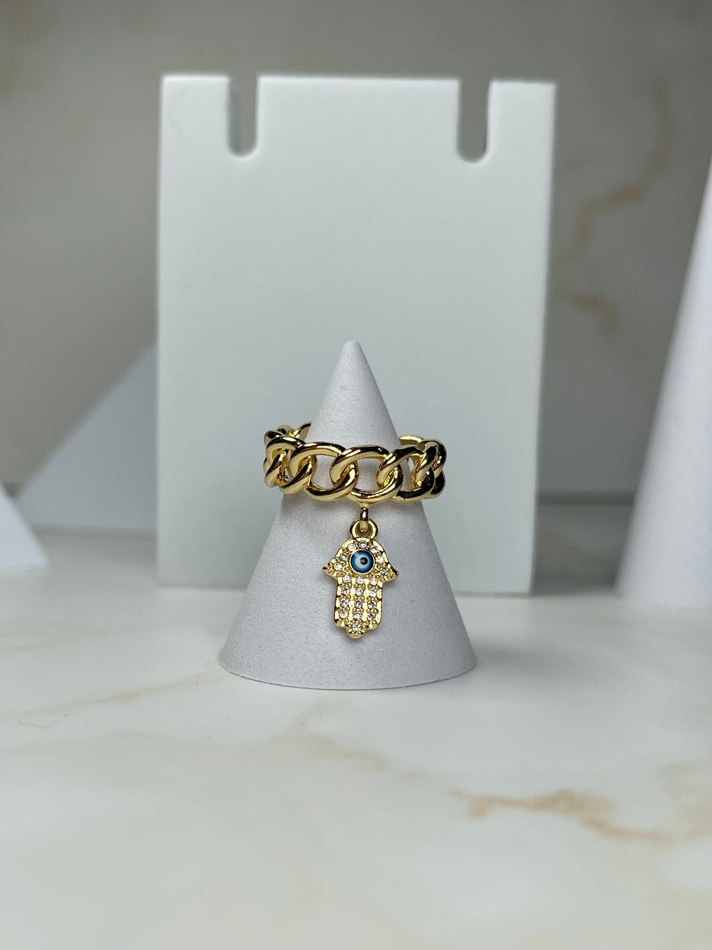 Gold chain ring with pendant
